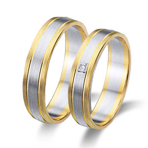 Aliança de casament d'or groc i or blanc amb diamant